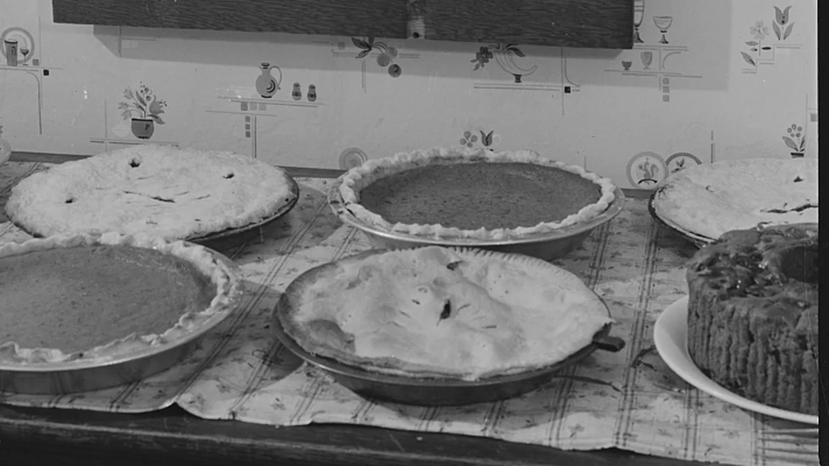 Pumpkin and fruit pies set out for Thanksgiving in Connecticut, 1940 Pumpkin pies and covered fruit pies lined up on a sideboard for a 1940 Thanksgiving dinner in Ledyard, Connecticut